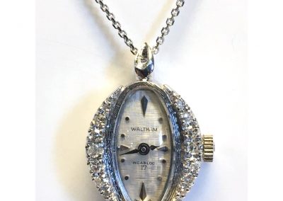 14 karat gold/Diamond Waltham wristwatch was turned into a contemporary necklace pendant!
